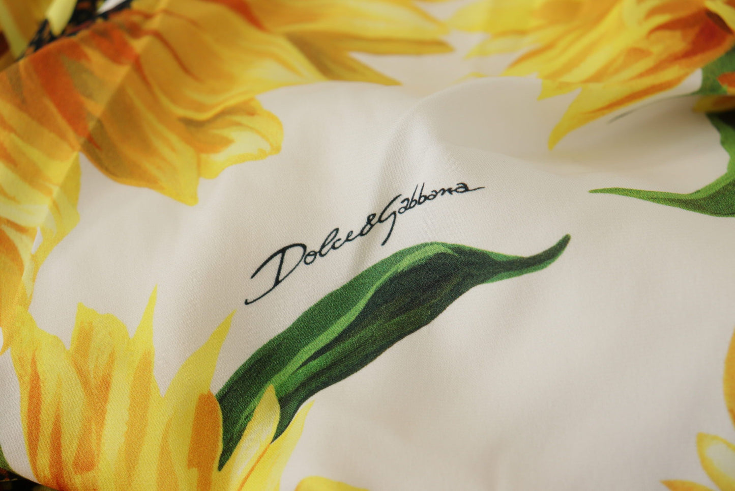 Dolce & Gabbana Weißes Etuikleid aus Seide mit Sonnenblumen-Print